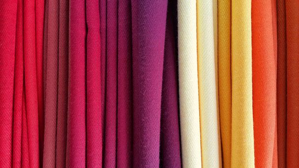 Bright multicolored background of fabrics, close-up texture - Fotografie, Obrázek