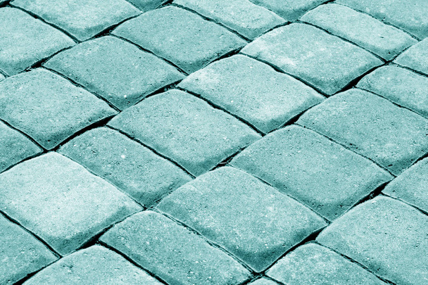 Pavimento de piedra Cobble en tono cian. Fondo abstracto y textura para el diseño
. - Foto, imagen
