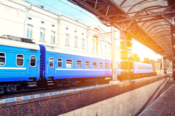 Russian passenger train is stationed at the station - Valokuva, kuva