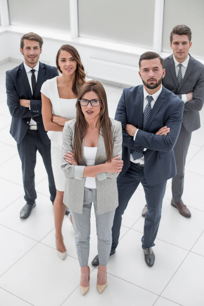 business woman standing in front of business team. - Foto, Imagem