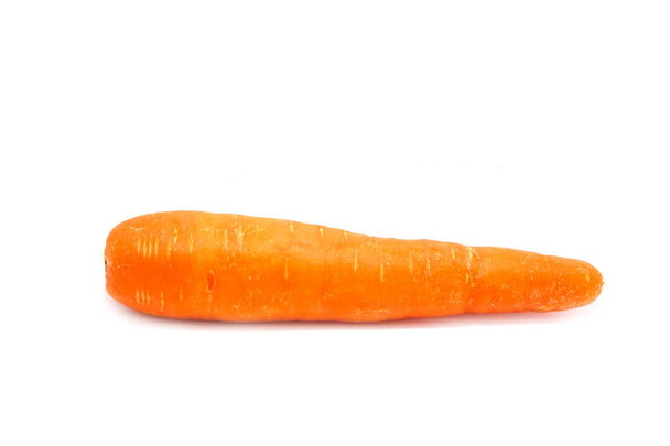 Carrot tubers isolated on white background - 写真・画像