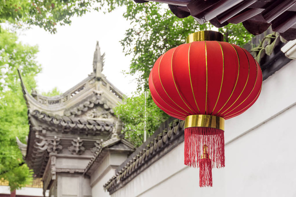 Traditional Chinese red lantern on street at the Old City of Shanghai in China. Shanghai is a popular tourist destination of Asia. - Foto, immagini