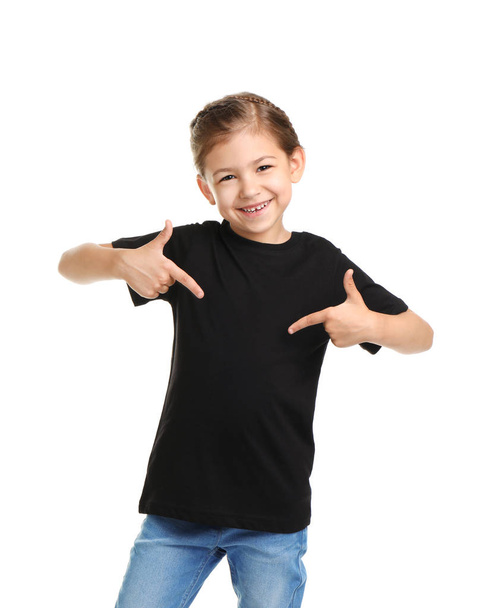 Little girl in t-shirt on white background. Mockup for design - Foto, immagini