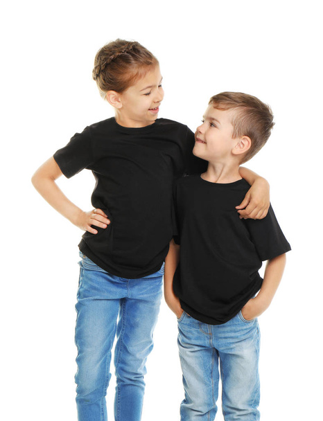 Little kids in t-shirts on white background. Mockup for design - Foto, Bild