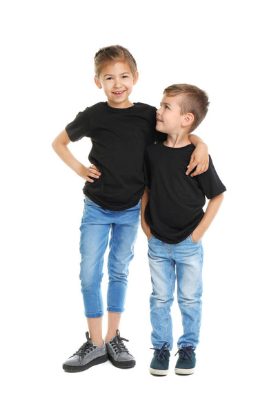 Little kids in t-shirts on white background. Mockup for design - Фото, изображение