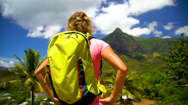 Female hiker enjoying remote scenic landscape Atuona mountains lush green tropical rainforest remote volcanic Island a paradise in the South Pacific Hiva Oa Marquesas - Footage, Video