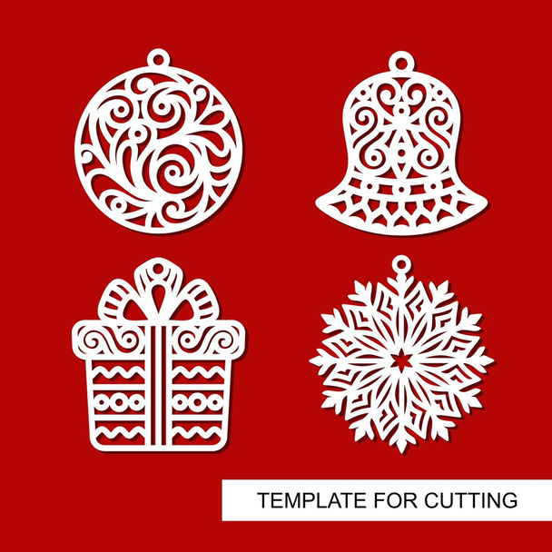 Conjunto de decoración navideña: campana, regalo, copo de nieve y bola. Plantillas para corte por láser, tallado en madera, corte por plotter o impresión
. - Vector, imagen