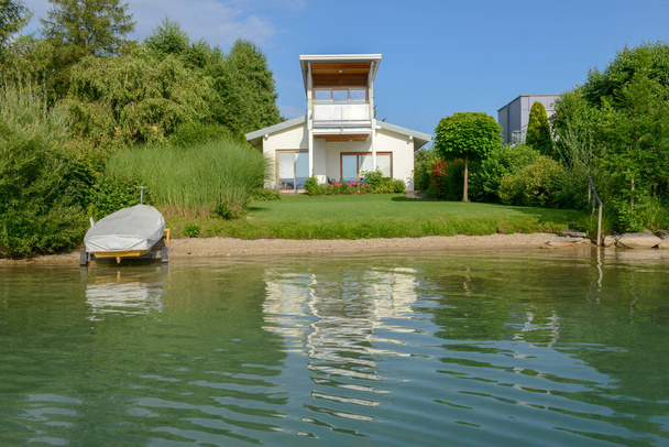 Modern house at lake Fakkar on Carinthia in Austria - Photo, Image