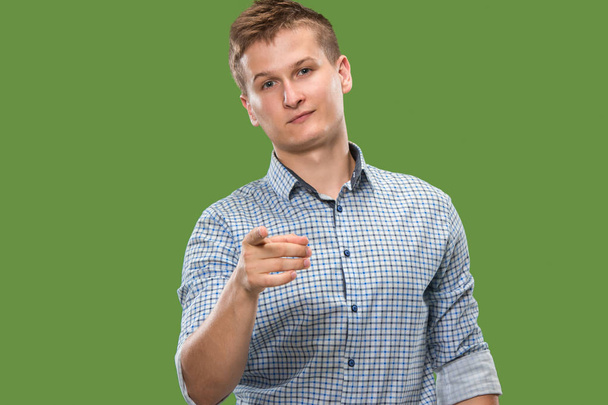 The overbearing businessman point you and want you, half length closeup portrait on green background. - Foto, Imagen