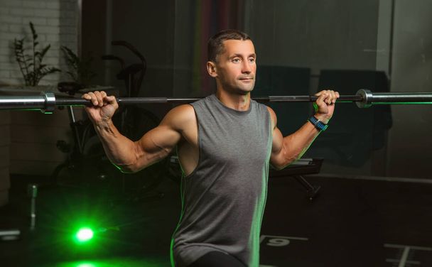 the man engaged in the gym - Photo, Image