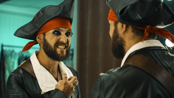 Man in pirate costume rehearsing scene - Photo, Image