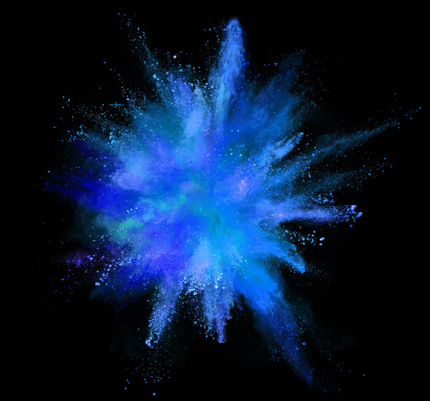 Explosion of coloured powder isolated on black background. Abstract colored background - Photo, image