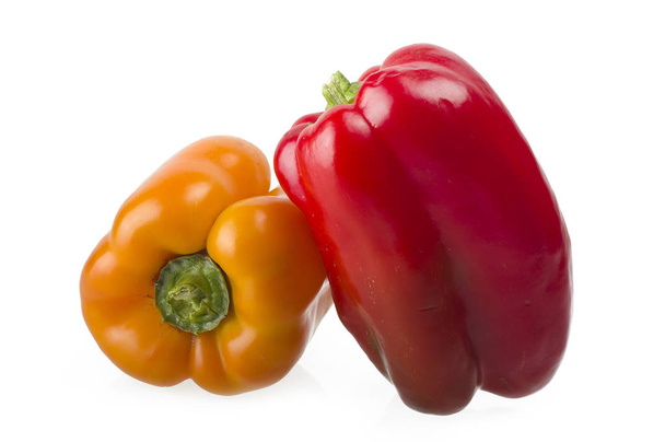 colored peppers close up over white background - Foto, afbeelding