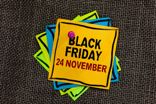 Text sign showing Black Friday 24 November. Conceptual photo Special sales Thanksgiving discounts Clearance Black bordered different color sticky note stick together with pin on jute sack - Photo, Image