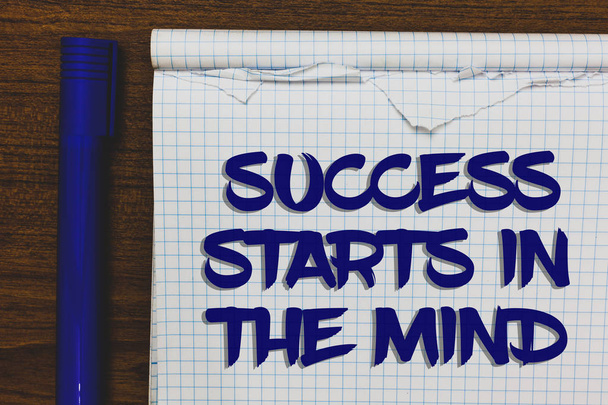Writing note showing Success Starts In The Mind. Business photo showcasing Have positive thoughts accomplish what you want Written white notepad on grey wooden background beside blue marker - 写真・画像