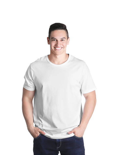 Young man in t-shirt on white background. Mockup for design - Foto, immagini