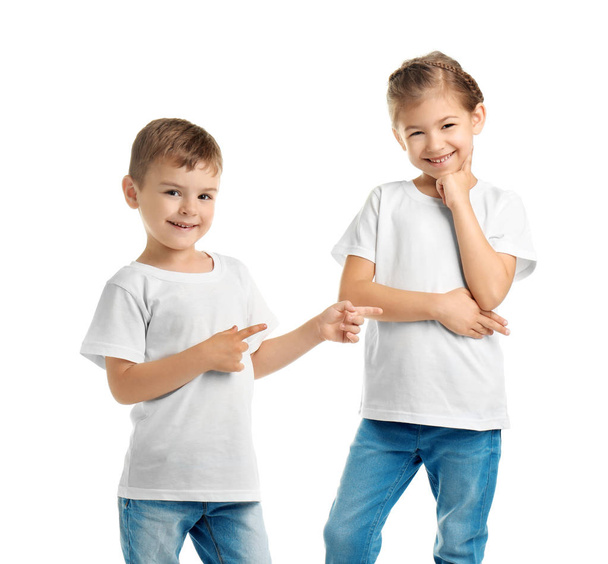 Little kids in t-shirts on white background. Mockup for design - Foto, imagen