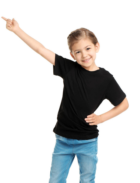 Little girl in t-shirt on white background. Mockup for design - Foto, afbeelding