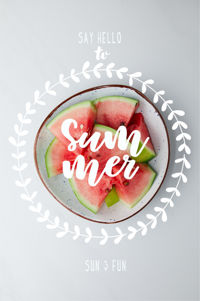 top view of fresh watermelon pieces in bowl on white tabletop, with "summer" inspection - Fotoğraf, Görsel