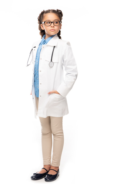 schoolchild in white coat looking away isolated on white - Photo, Image