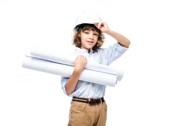 schoolboy in costume of architect and helmet holding blueprints isolated on white - Foto, afbeelding