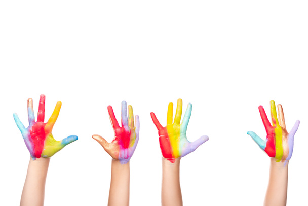 imagen recortada de los escolares que muestran las manos pintadas de colores aislados en blanco
 - Foto, Imagen
