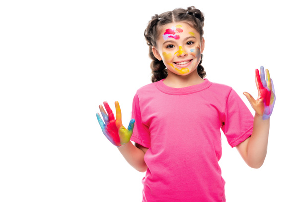 smiling schoolchild showing painted hands isolated on white - Photo, Image