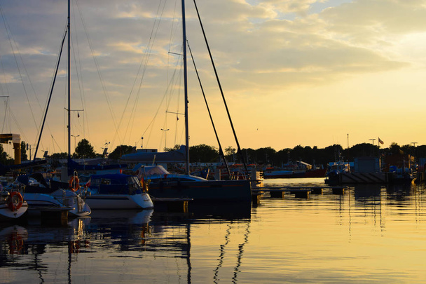 The sun sets over the yacht berth - Photo, Image