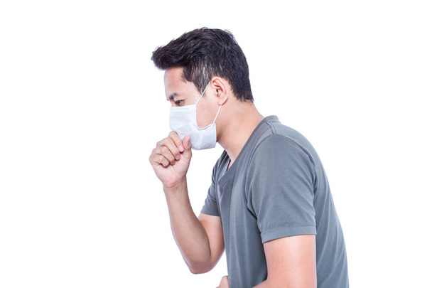 A sick man wear hygienic mask and cough. - Foto, Imagen