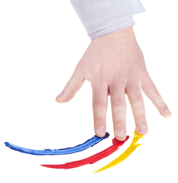 hand that colors on a white background - Photo, Image