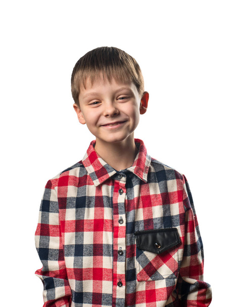 Laughing boy in a shirt on a white background - Foto, immagini