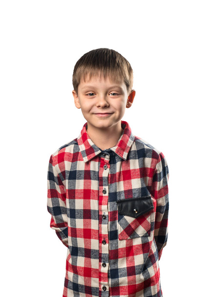 Πορτρέτο του ένα όμορφο μικρό αγόρι σε λευκό φόντο - Φωτογραφία, εικόνα