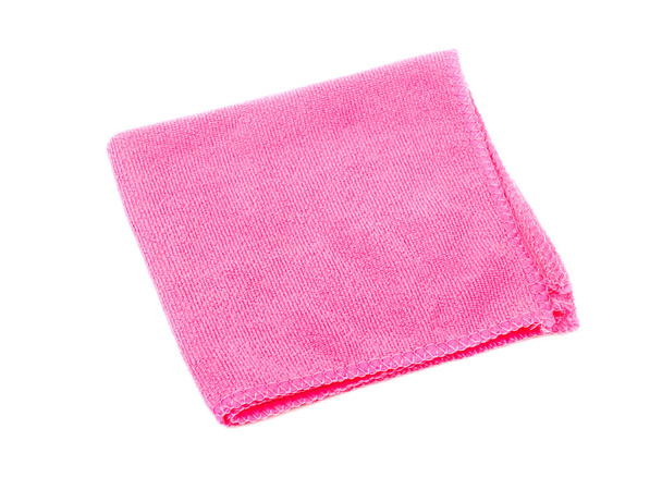 Pequeña toalla de cocina rosa sobre fondo blanco
 - Foto, imagen