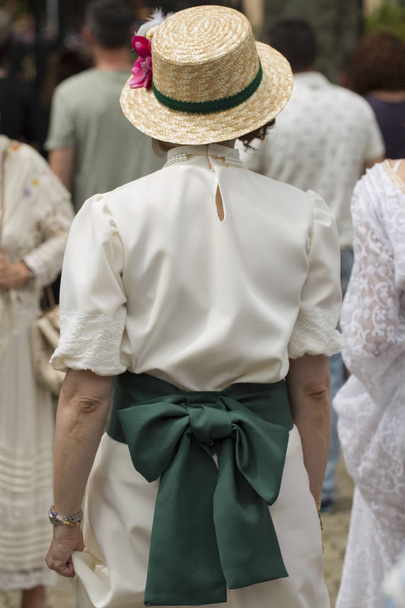 Rear view of a woman with hat - Photo, Image