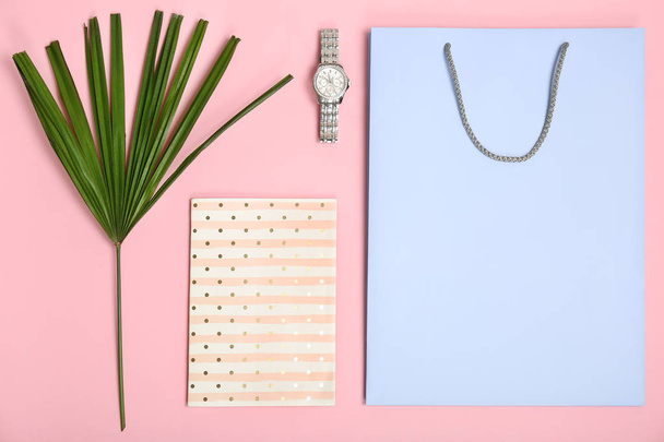 Stylish flat lay composition with shopping bag on color background - Valokuva, kuva