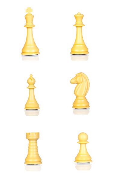 набор шахматных фигур желтого цвета на белом фоне
 - Фото, изображение