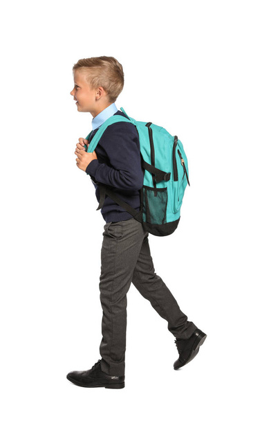 Little boy in stylish school uniform on white background - Φωτογραφία, εικόνα