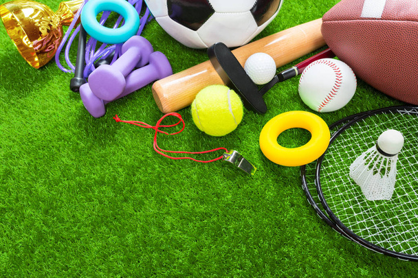 Various sport tools on green grass - Fotoğraf, Görsel