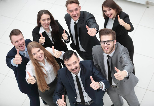 successful business team holding up a thumbs up - Photo, Image