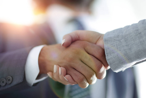 Businessmen handshaking after successful business meeting - Фото, зображення