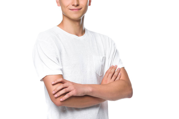 cropped image man in white shirt standing with crossed arms isolated on white - Photo, Image