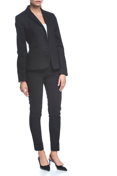cropped shot of young businesswoman in stylish black suit isolated on white - Foto, imagen