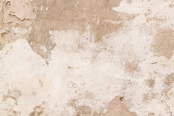 Old empty dirty plaster wall with cracked structure as background. - 写真・画像