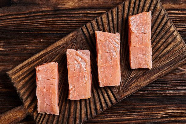 Salted salmon on the wood background - Photo, Image