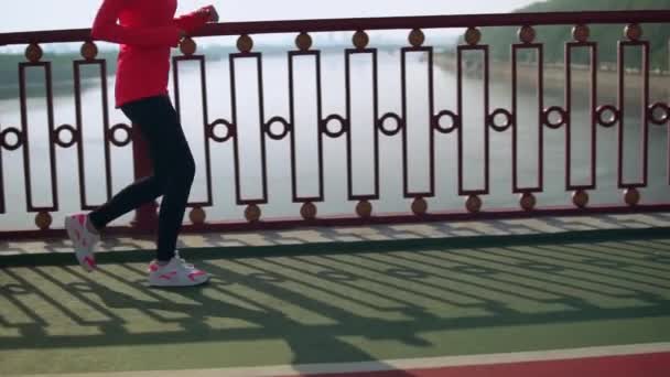 woman jogging outdoors - Filmagem, Vídeo