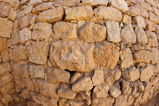 Опукла стародавня кам'яна текстура стін
 - Фото, зображення