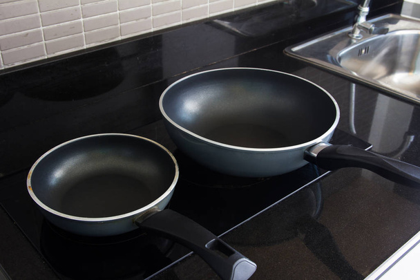 pan on induction cooker - Photo, Image