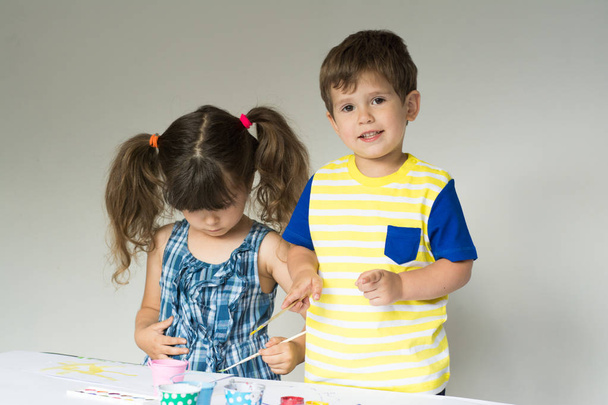 Curious boy and girl studying  in nursery room - Photo, Image
