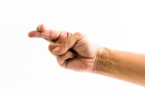 Рука человека показывает крест пальцев изолированы на белом фоне, Отрицательный знак клятвы
 - Фото, изображение
