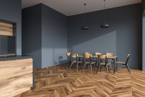 Wooden floor kitchen corner with wooden and gray countertops and a long table standing in the background. Close up. 3d rendering mock up - Foto, afbeelding